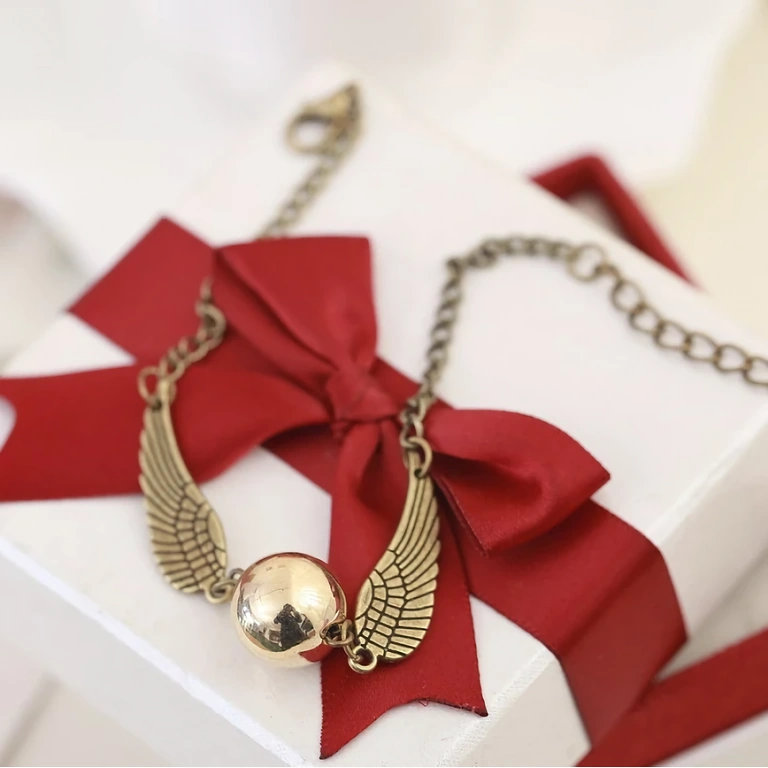 Pulseira temática da série Harry Potter – modelo com Snitch