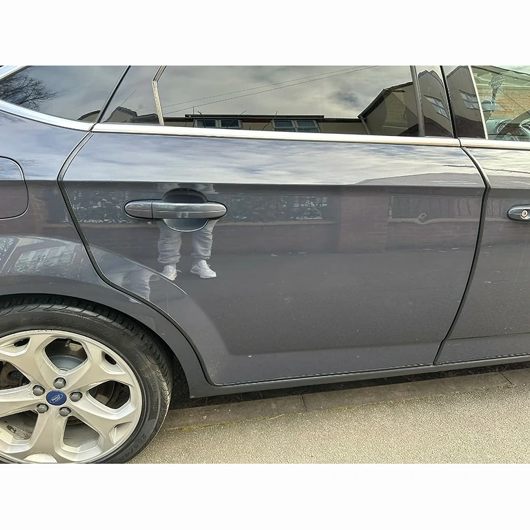 Fita flexível para proteção das bordas das portas do veículo